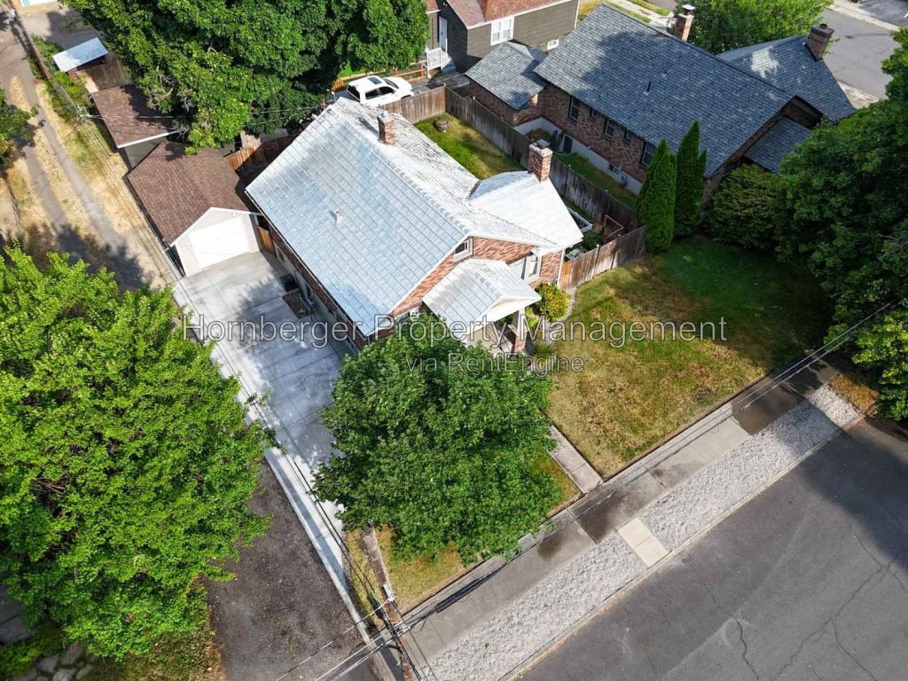 Spacious South Hill Home with Primary Suite and Beautiful Fenced Backyard - Image 30