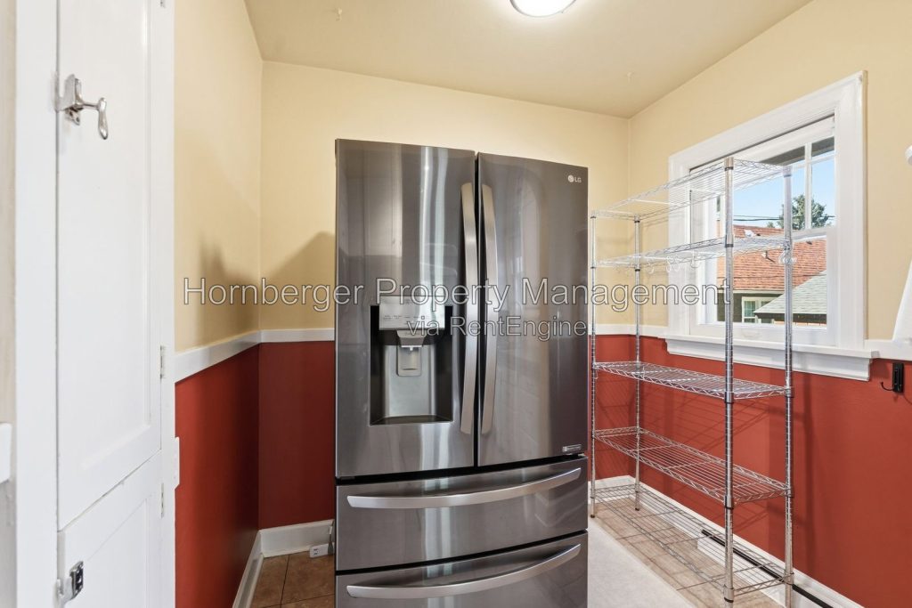 Spacious South Hill Home with Primary Suite and Beautiful Fenced Backyard - Image 5