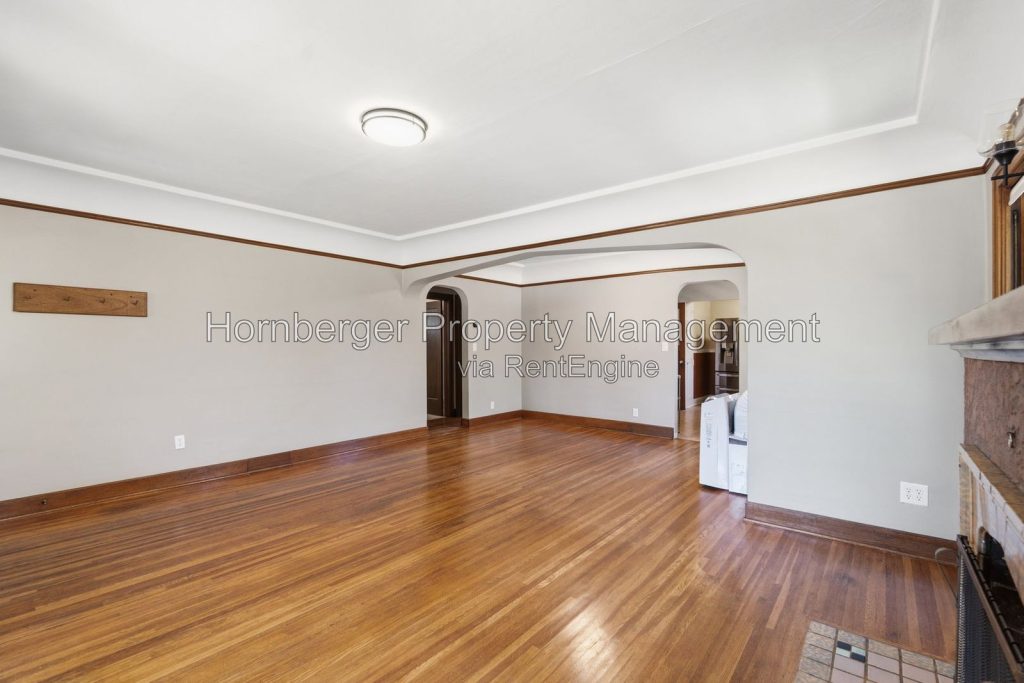Spacious South Hill Home with Primary Suite and Beautiful Fenced Backyard - Image 6