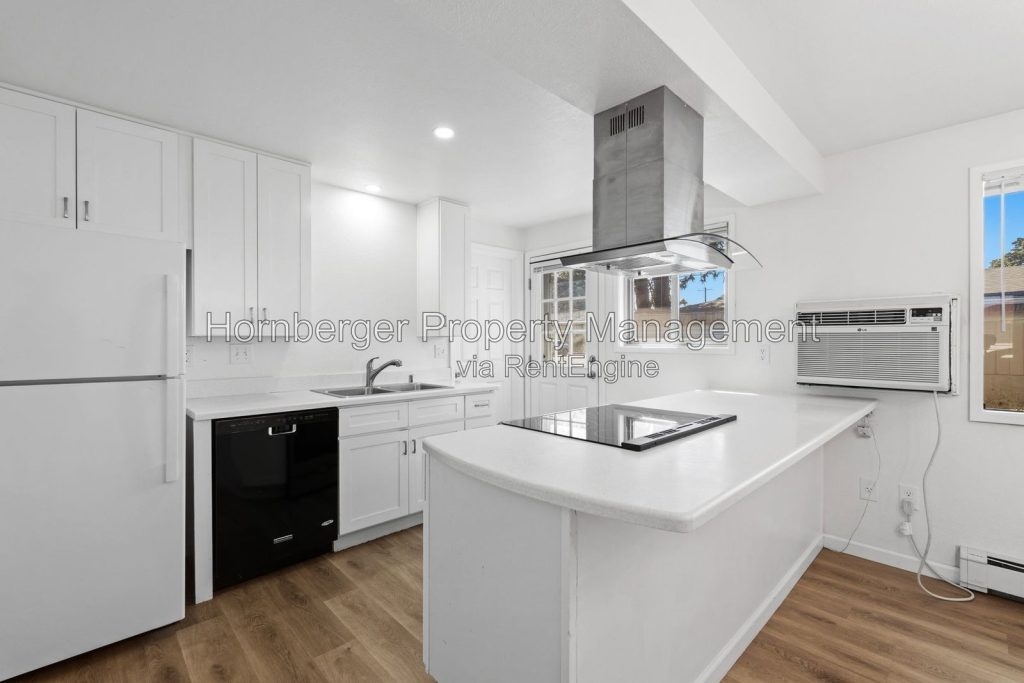 Spacious Updated 4 Bedroom South Hill Duplex with Heated Two Car Garage - Image 1